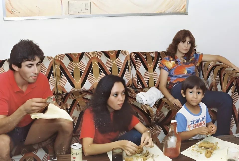 1980s film-stock family gathering indoors